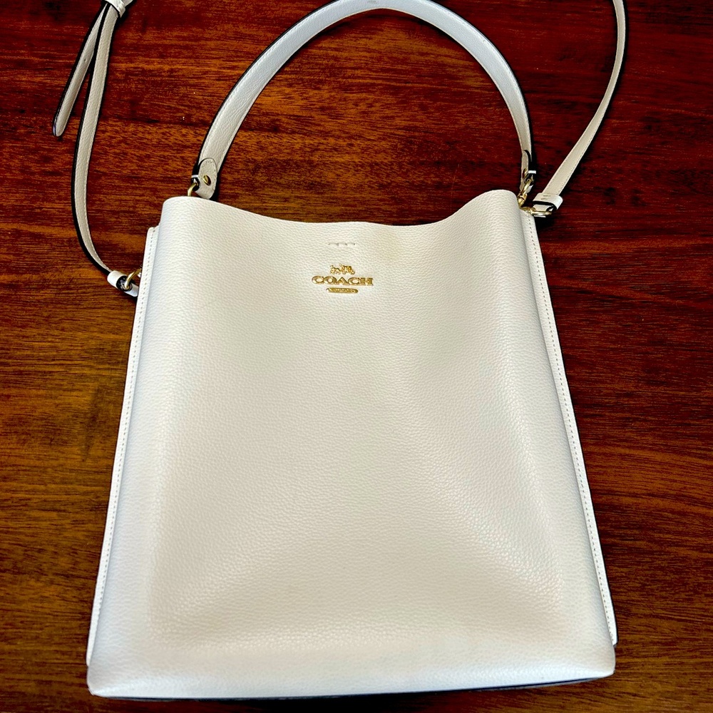 Coach purse bucket style . Used once.great for spring or office wear